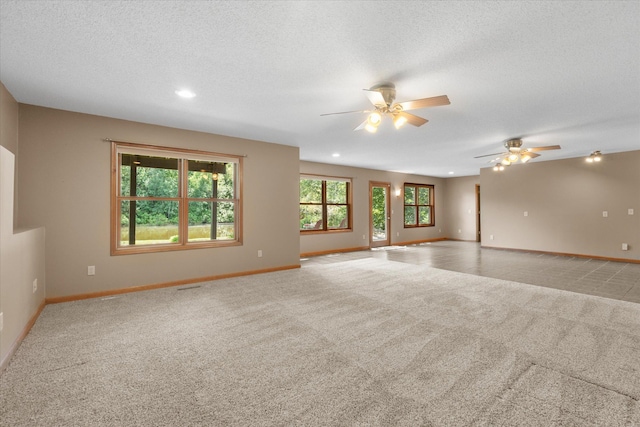 6961 Meadow Ct, Centerville, MN 55038 - unfurnished room featuring carpet flooring, a ceiling fan, a textured ceiling, and recessed lighting