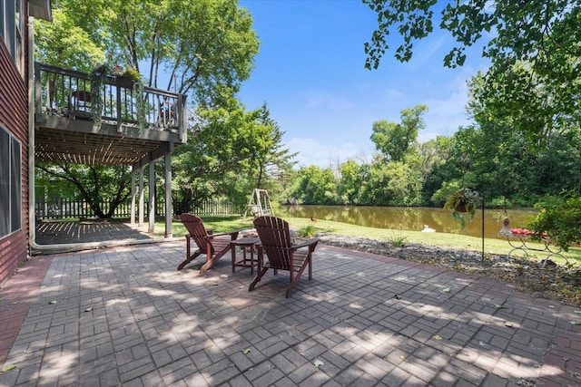 6961 Meadow Ct, Centerville, MN 55038 - fenced backyard featuring a patio, a deck, and view of wooded area