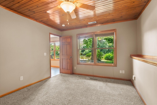 6961 Meadow Ct, Centerville, MN 55038 - empty room featuring wood ceiling, healthy amount of natural light, carpet flooring, crown molding, and ceiling fan