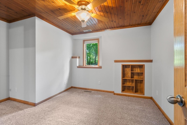 6961 Meadow Ct, Centerville, MN 55038 - carpeted empty room with crown molding, wood ceiling, and a ceiling fan