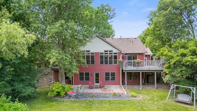 6961 Meadow Ct, Centerville, MN 55038 - back of property featuring a patio, a lawn, a deck, and a shingled roof