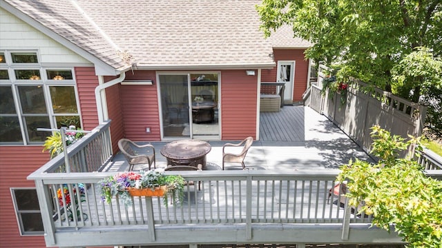 6961 Meadow Ct, Centerville, MN 55038 - wooden deck with a fire pit