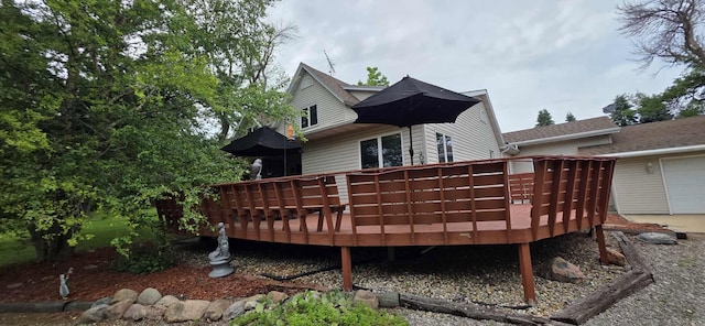 2473 Marshall St, Albert Lea, MN 56007 - back of property featuring a garage and a wooden deck