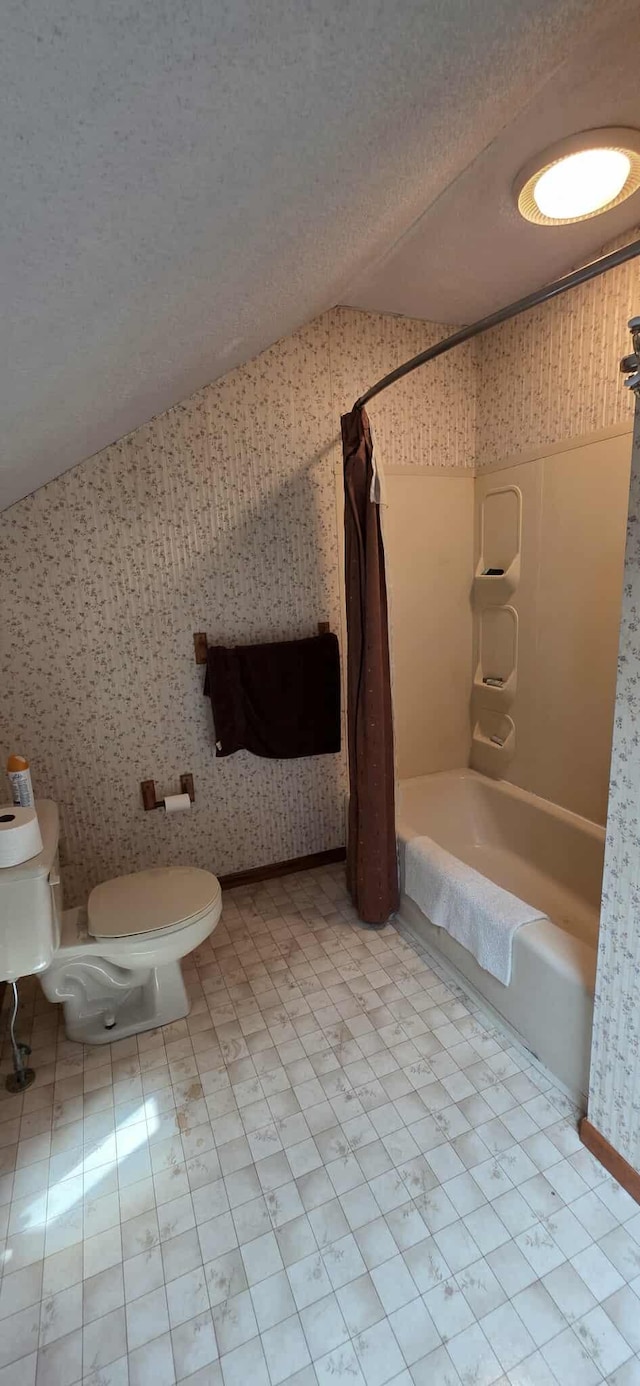 2473 Marshall St, Albert Lea, MN 56007 - full bath with wallpapered walls, bathtub / shower combination, and a textured ceiling