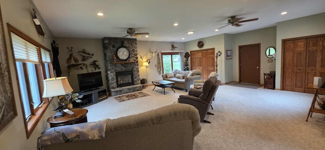 2473 Marshall St, Albert Lea, MN 56007 - carpeted living area featuring ceiling fan, recessed lighting, and a stone fireplace