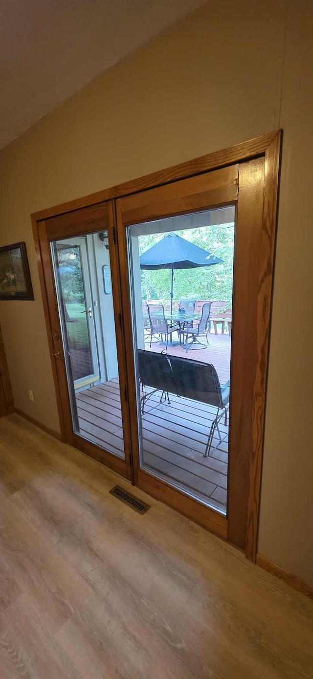2473 Marshall St, Albert Lea, MN 56007 - doorway to outside with wood finished floors