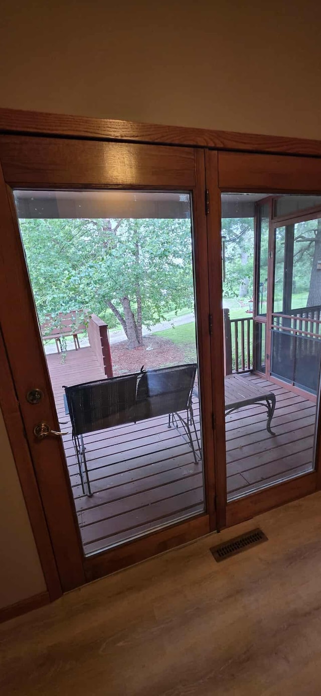 2473 Marshall St, Albert Lea, MN 56007 - doorway to outside with wood finished floors