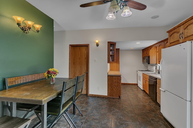 216 1st St SW, Melrose, MN 56352 - dining space featuring ceiling fan, dark stone finish floors, and recessed lighting