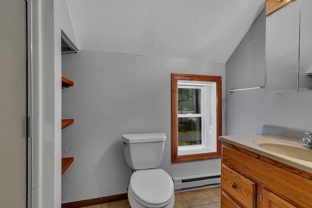 216 1st St SW, Melrose, MN 56352 - bathroom featuring a baseboard radiator, vanity, vaulted ceiling, and tile patterned floors