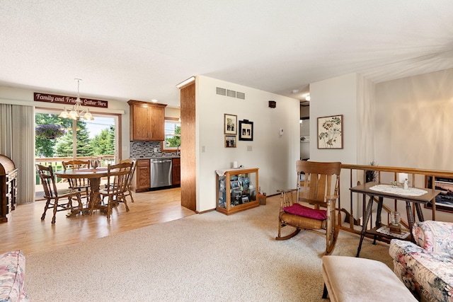 1602 19th Ave SW, Austin, MN 55912 - living area featuring a chandelier and light colored carpet