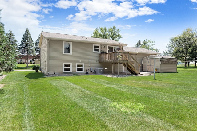 1602 19th Ave SW, Austin, MN 55912 - back of house featuring stairs, a storage unit, a wooden deck, and a lawn