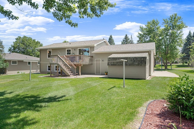 1602 19th Ave SW, Austin, MN 55912 - rear view of house featuring a wooden deck, stairs, a yard, and a shingled roof