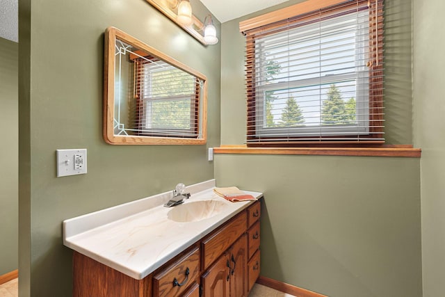 1602 19th Ave SW, Austin, MN 55912 - bathroom featuring vanity and baseboards