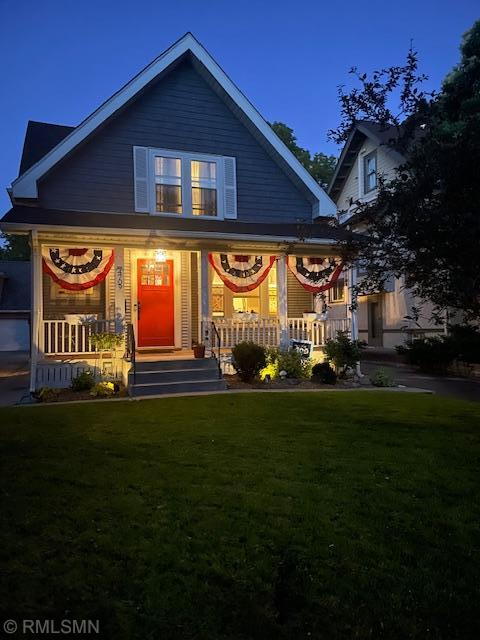 4709 Colfax Ave S, Minneapolis, MN 55419 - view of front of home with a porch and a front lawn