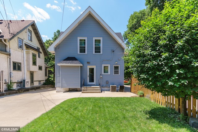 4709 Colfax Ave S, Minneapolis, MN 55419 - rear view of house with a shingled roof