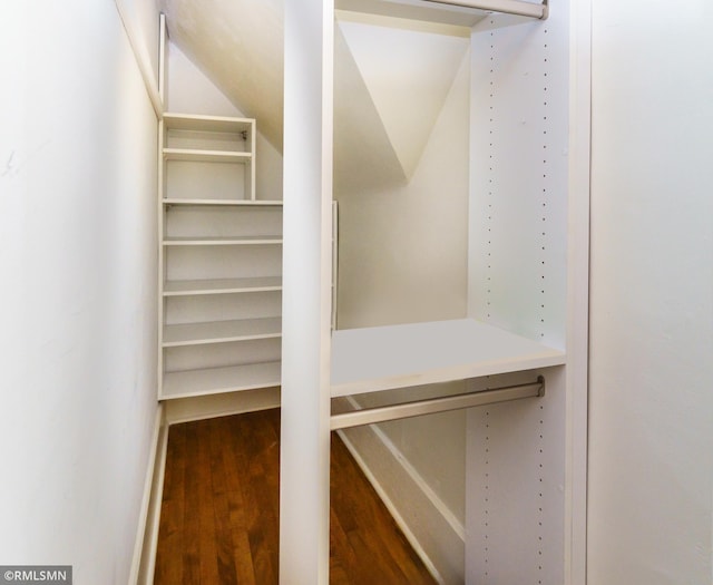 4709 Colfax Ave S, Minneapolis, MN 55419 - walk in closet with wood finished floors and vaulted ceiling