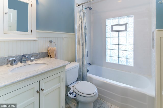 4709 Colfax Ave S, Minneapolis, MN 55419 - full bath with shower / tub combo, vanity, wainscoting, and plenty of natural light