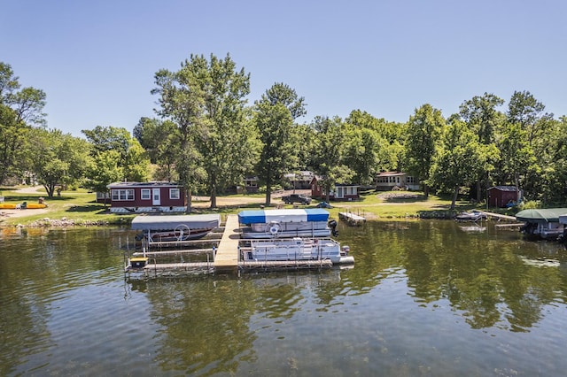 29501 Maplewood Rd Longshore, Unit Longshore, Callaway, MN 56521 - dock area with boat lift, a water view, and view of wooded area