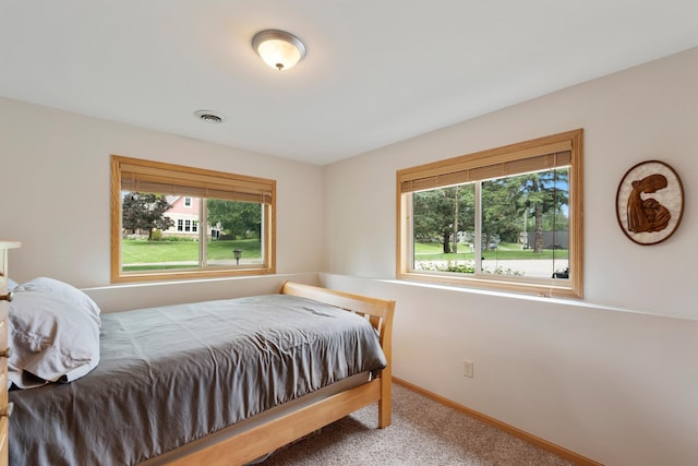 818 Myrtle St, Buffalo, MN 55313 - carpeted bedroom featuring baseboards