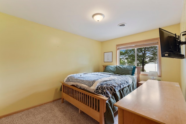 818 Myrtle St, Buffalo, MN 55313 - bedroom with carpet floors and baseboards