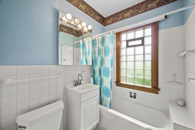 5043 Nokomis Ave, Minneapolis, MN 55417 - full bathroom with tile walls, vanity, and shower / tub combo with curtain