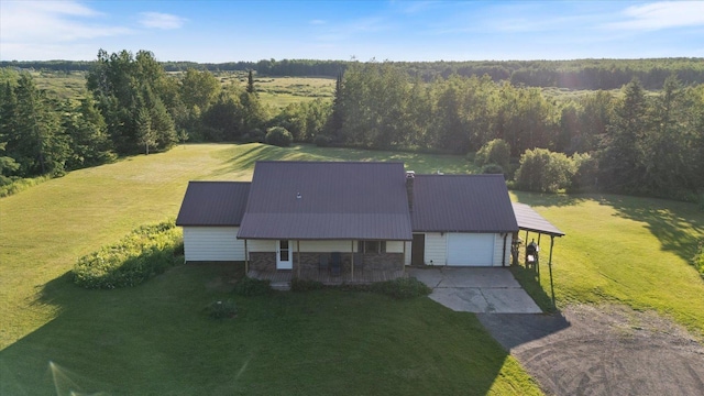 4069 Dublin Rd, Hibbing, MN 55746 - aerial view of property and surrounding area featuring a heavily wooded area