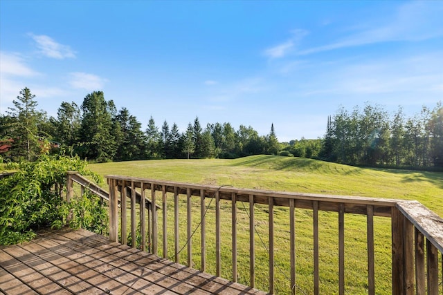 4069 Dublin Rd, Hibbing, MN 55746 - wooden deck featuring a lawn