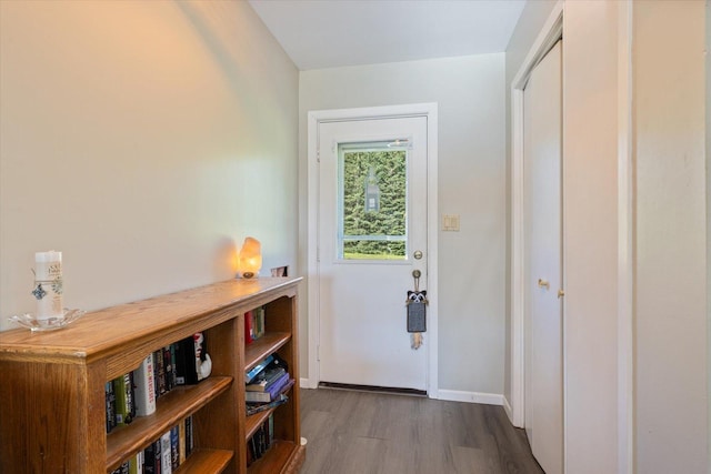 4069 Dublin Rd, Hibbing, MN 55746 - doorway featuring dark wood finished floors and baseboards