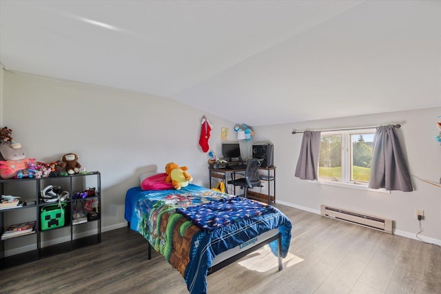 4069 Dublin Rd, Hibbing, MN 55746 - bedroom with a baseboard heating unit, wood finished floors, and lofted ceiling