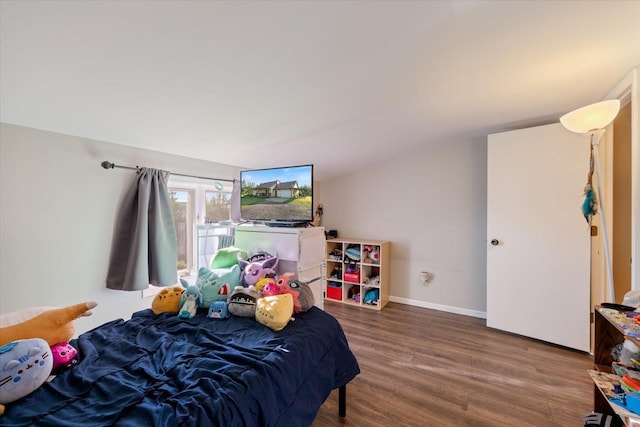 4069 Dublin Rd, Hibbing, MN 55746 - bedroom featuring wood finished floors and baseboards