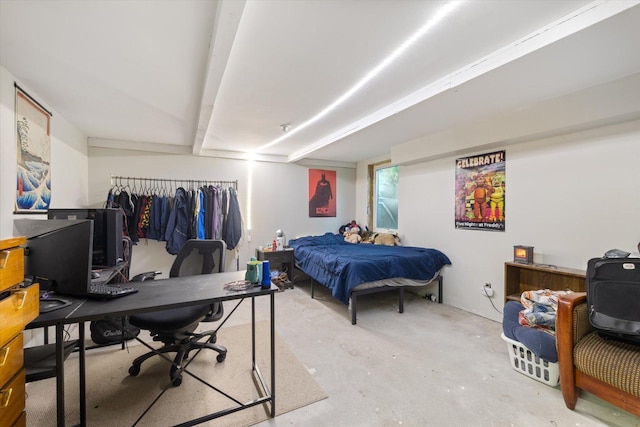 4069 Dublin Rd, Hibbing, MN 55746 - bedroom with unfinished concrete flooring and an office area