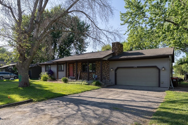 1478 Walnut St, Prescott, WI 54021 - single story home with driveway, an attached garage, a front yard, and a chimney