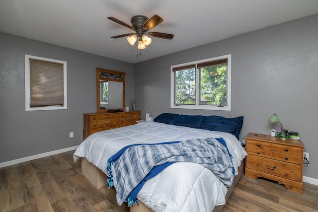 1478 Walnut St, Prescott, WI 54021 - bedroom with wood finished floors, multiple windows, and ceiling fan