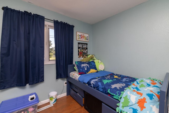 1478 Walnut St, Prescott, WI 54021 - bedroom featuring wood finished floors and baseboards