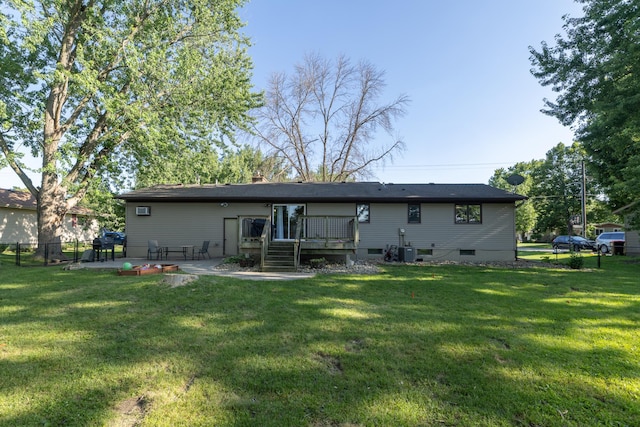 1478 Walnut St, Prescott, WI 54021 - back of house featuring a patio area, a chimney, and a wooden deck