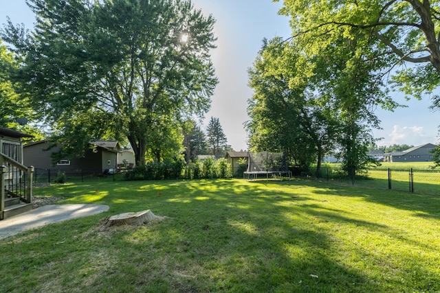 1478 Walnut St, Prescott, WI 54021 - fenced backyard featuring a trampoline