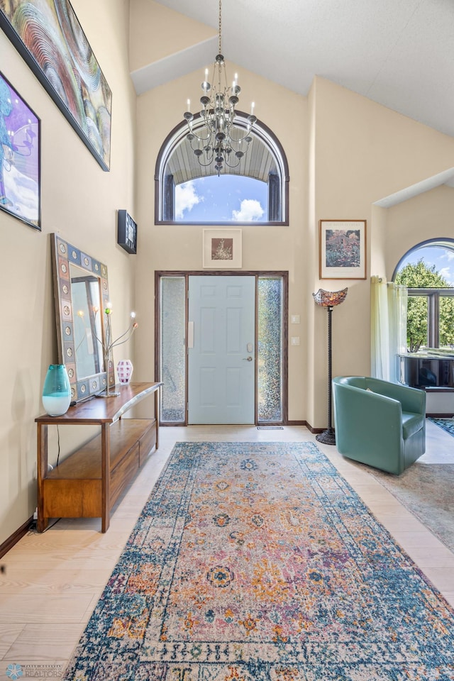 525 20 1/2 Ave E, West Fargo, ND 58078 - entryway featuring a chandelier and high vaulted ceiling