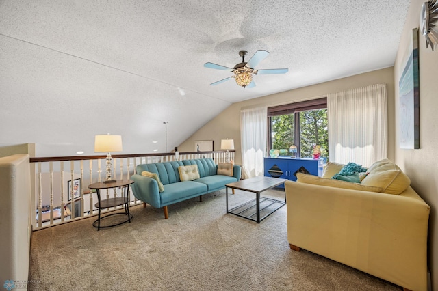 525 20 1/2 Ave E, West Fargo, ND 58078 - living room featuring a ceiling fan, a textured ceiling, carpet floors, and lofted ceiling