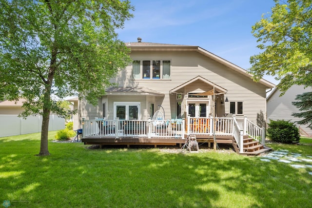 525 20 1/2 Ave E, West Fargo, ND 58078 - back of property with french doors and a wooden deck