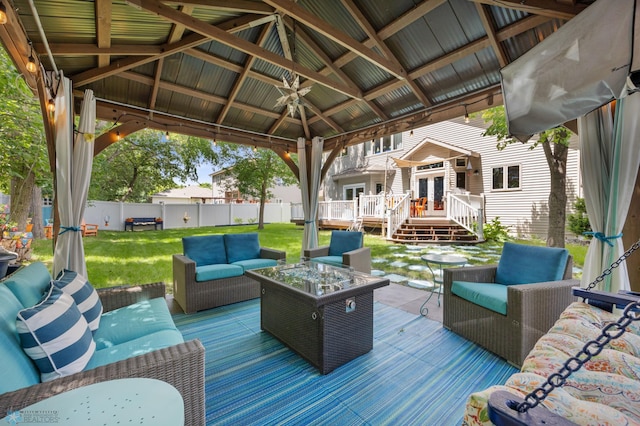 525 20 1/2 Ave E, West Fargo, ND 58078 - wooden deck featuring an outdoor living space with a fire pit, a fenced backyard, french doors, and a gazebo