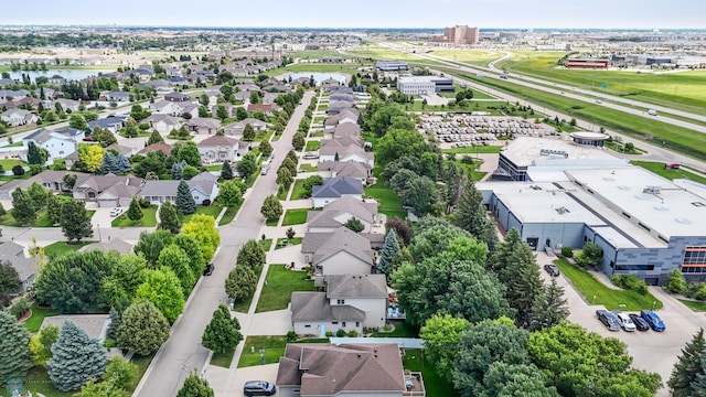 525 20 1/2 Ave E, West Fargo, ND 58078 - aerial perspective of suburban area featuring a large body of water