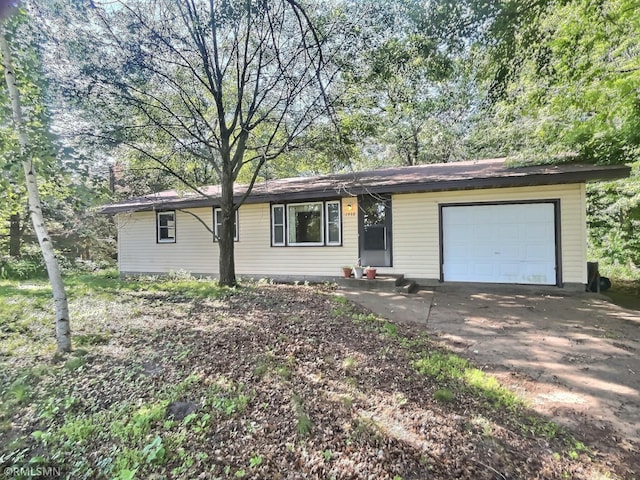 1938 149th Ave NE, Ham Lake, MN 55304 - ranch-style house with an attached garage and driveway