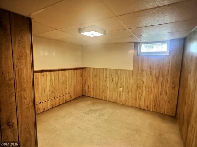 1938 149th Ave NE, Ham Lake, MN 55304 - basement with wood walls, a drop ceiling, and wainscoting
