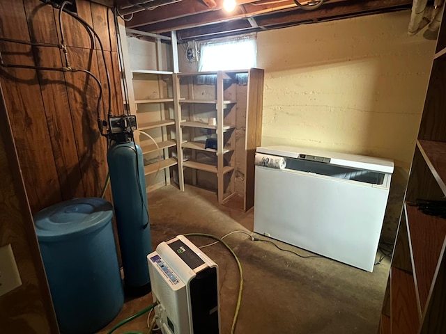 201 3rd St SE, Renville, MN 56284 - below grade area featuring fridge and a water softener