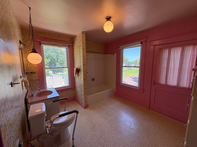 201 3rd St SE, Renville, MN 56284 - full bathroom featuring tub / shower combination, vanity, and wallpapered walls