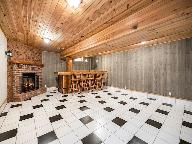 20980 Parkfield Ave, Spring Lake Twp, MN 55352 - interior space with a dry bar, wood ceiling, wooden walls, a brick fireplace, and tile patterned flooring