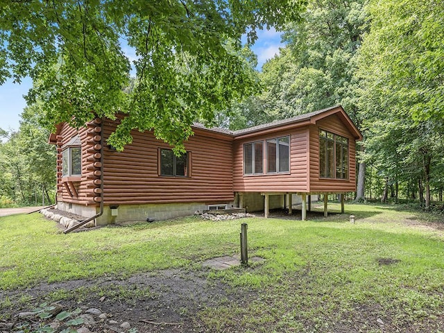 20980 Parkfield Ave, Spring Lake Twp, MN 55352 - back of property with a lawn and log siding