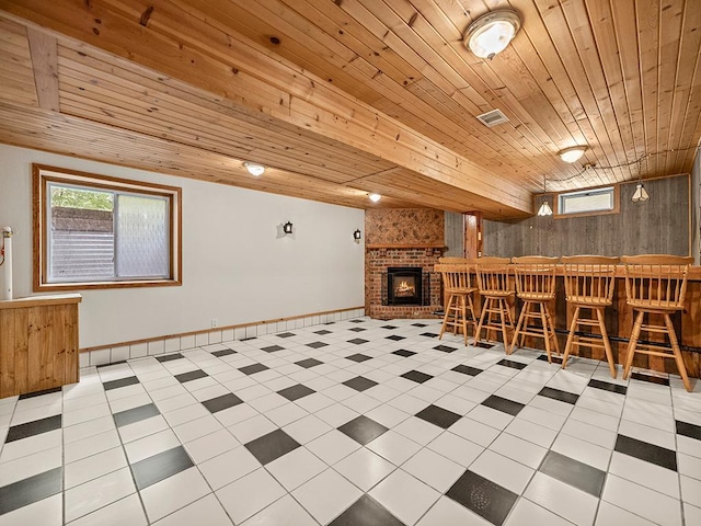20980 Parkfield Ave, Spring Lake Twp, MN 55352 - interior space featuring wooden ceiling, a bar, tile patterned floors, and a brick fireplace