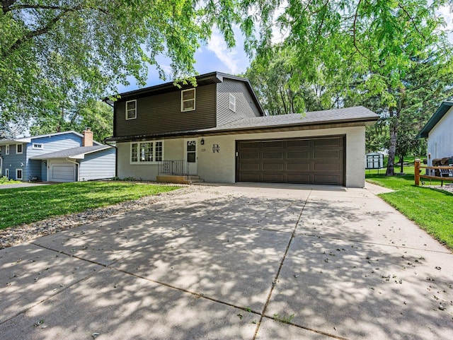 724 2nd Ave S, Buffalo, MN 55313 - traditional-style house with driveway, an attached garage, a front yard, and stucco siding