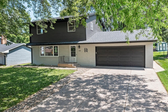 724 2nd Ave S, Buffalo, MN 55313 - traditional home with concrete driveway, a garage, a front yard, and roof with shingles